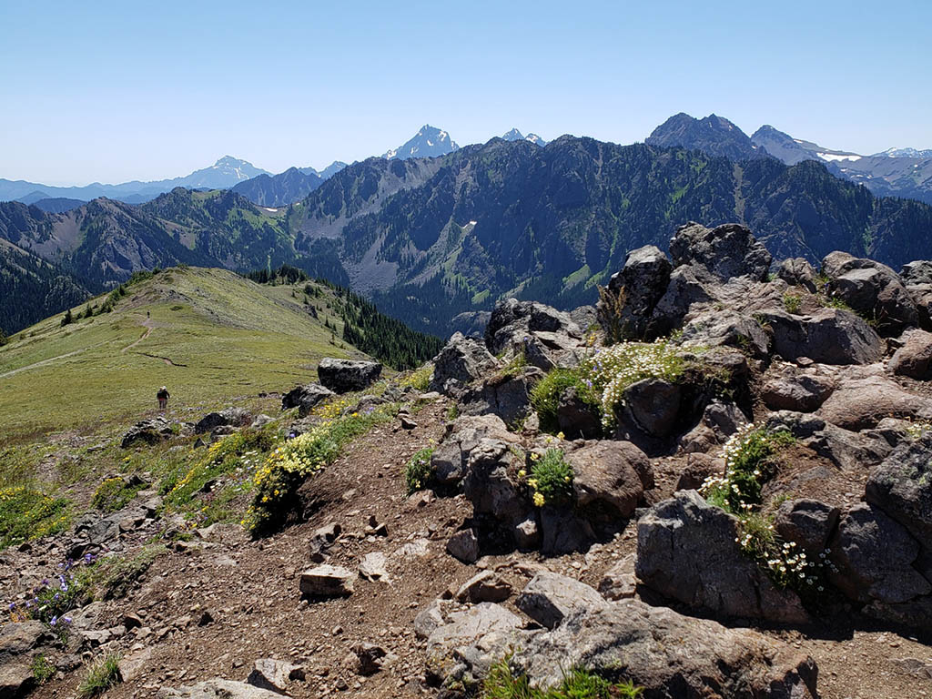 view from a high mountain of mountain range in distance